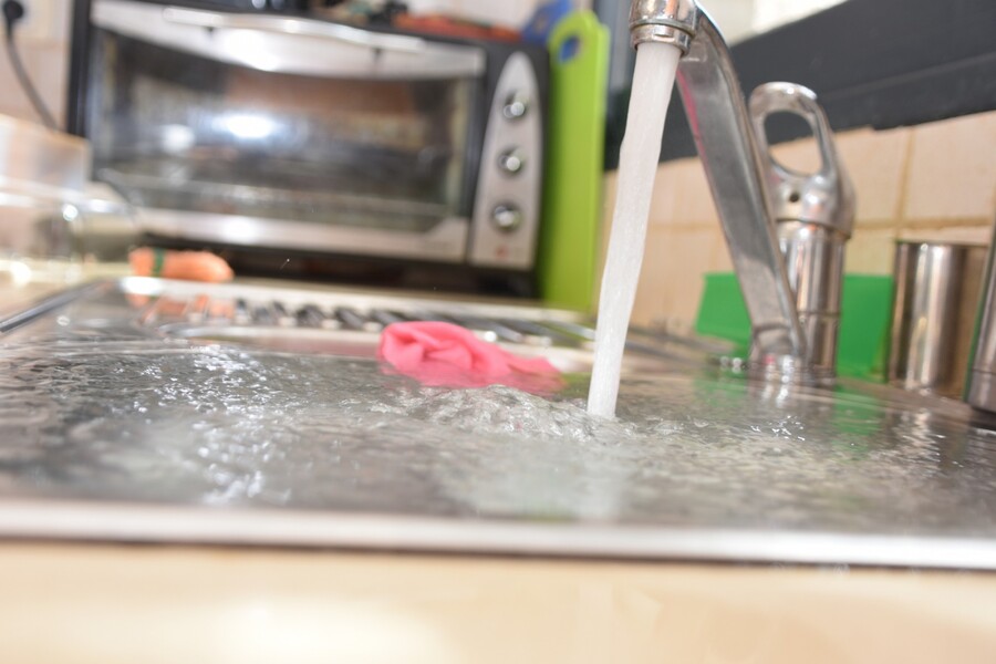 Sink overflowing due to clogged drain ... call Liberty Plumbing and Drain for drain cleaning.