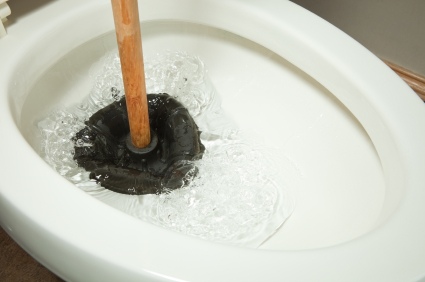 Toilet repair by Liberty Plumbing and Drain